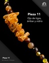 Pieza 11 · Ojo de tigre, ámbar y vidrio